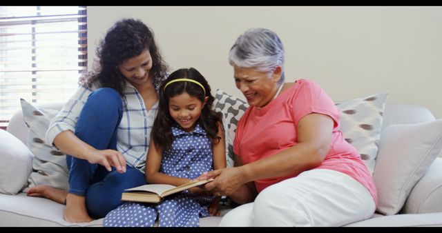 Happy Family Bonding Around Storytime Across Generations - Download Free Stock Images Pikwizard.com