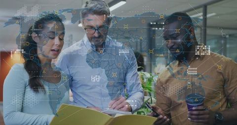 Collaborating team reviewing global data visualization and analytics for business insights