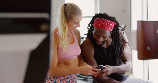 Two Fit Friends Sharing Workout Tips at Gym - Download Free Stock Images Pikwizard.com