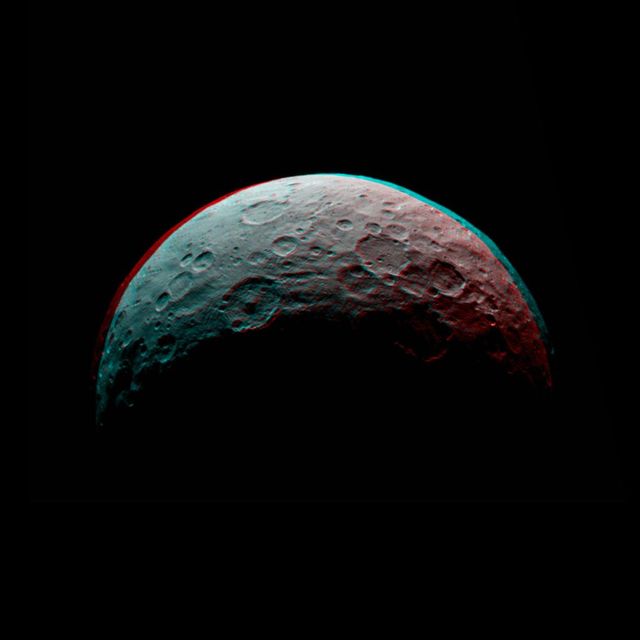 Detail of Ceres, captured in 3D by NASA's Dawn spacecraft from approximately 8500 miles in April 2015. Each impact crater is visible under 3D glasses, contributing to research in planetary science and the study of dwarf planets. Ideal for educational materials on astronomy, publications about space exploration, and scientific research presentations.
