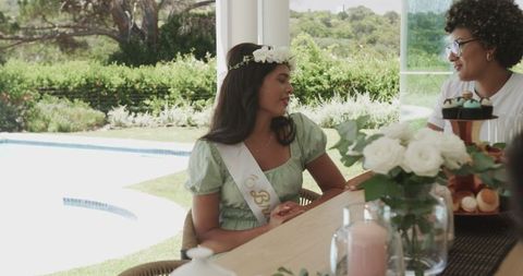 Bride-to-be Smiling with Friends in Outdoor Party Setting
