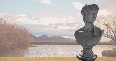 Classical Stone Sculpture in Scenic Mountain Landscape