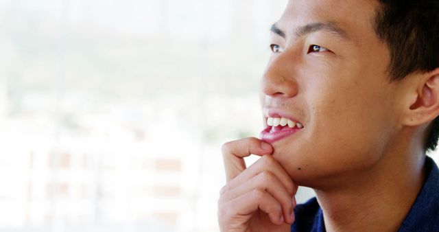 Young Man Contemplating Future, Looking Optimistic - Download Free Stock Images Pikwizard.com