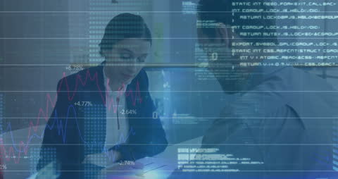 Business Professionals Analyzing High-Tech Data Trends