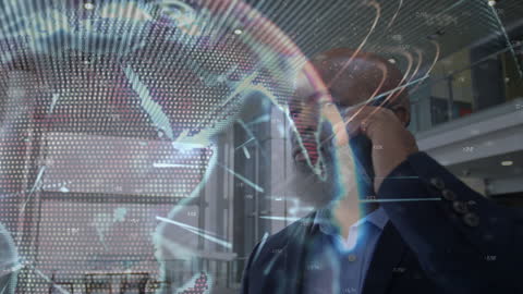 Businessman Engaged with Digital World Globe Projection