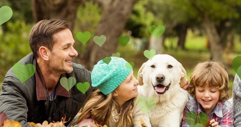 Happy Family Bonding with Dog in Autumn Park - Download Free Stock Images Pikwizard.com