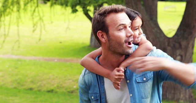 Father Carrying Daughter on His Shoulders in Park - Download Free Stock Images Pikwizard.com