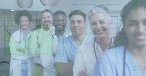 Medical team standing with data overlay for healthcare analysis