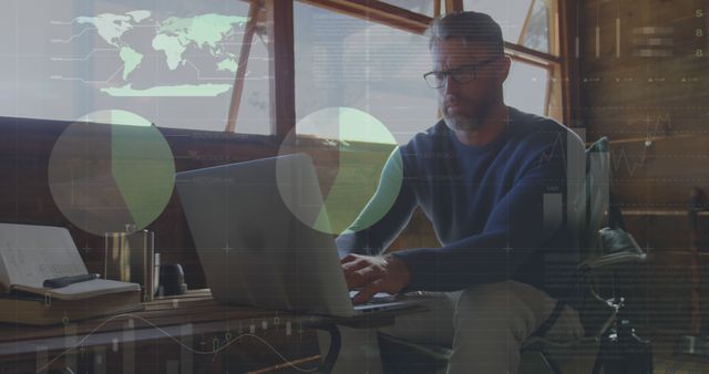 Man Working on Laptop with Virtual Data Graphics Overlay - Download Free Stock Images Pikwizard.com