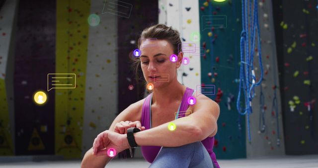 Woman Using Smartwatch After Rock Climbing with Digital Notifications - Download Free Stock Images Pikwizard.com