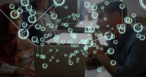 Team collaborating with augmented reality network overlay for data visualization