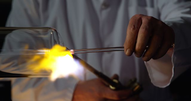 Glassblower Shaping Molten Glass with Blowtorch in Workshop - Download Free Stock Images Pikwizard.com