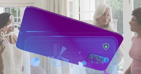 Women consulting during dress fitting with purple digital data overlay in boutique