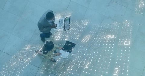 Digital data overlay on colleagues collaborating in office setting