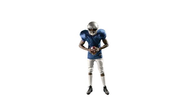 American Football Player in Blue Jersey Holding Ball Isolated on White Background - Download Free Stock Images Pikwizard.com