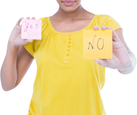 Woman holding transparent yes or no cards in yellow shirt