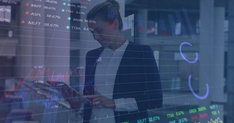 Businesswoman Analyzing Financial Data on Tablet with Digital Overlay - Download Free Stock Images Pikwizard.com