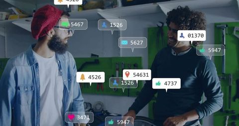 Bicycle mechanics chatting in workshop surrounded by social media notifications and icons