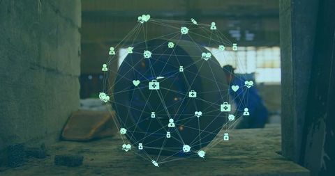 Hovering holographic network sphere projecting health icons over tire industrial workshop