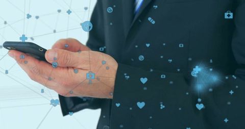 Executive Holding Smartphone for Telemedicine and Digital Health Network with Medical Icons