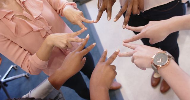 Diverse Team Forming A Star with Hands in Unity Gesture - Download Free Stock Images Pikwizard.com