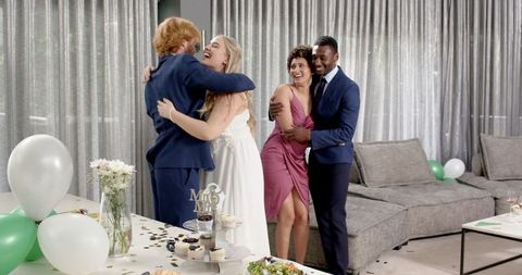 Joyful Wedding Reception with Friends Dancing and Celebrating