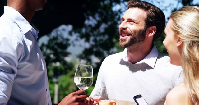 Friends Enjoying Outdoor Gathering with Wine and Good Conversation - Download Free Stock Images Pikwizard.com