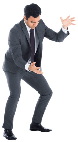 Focused Businessman Holding Something on Transparent Background - Download Free Stock Videos Pikwizard.com