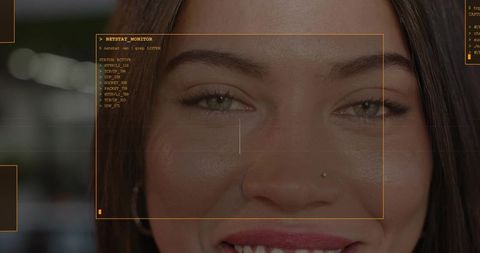 Closeup Woman Undergoing Biometric Facial Scan with Orange HUD Overlay and Nose Stud