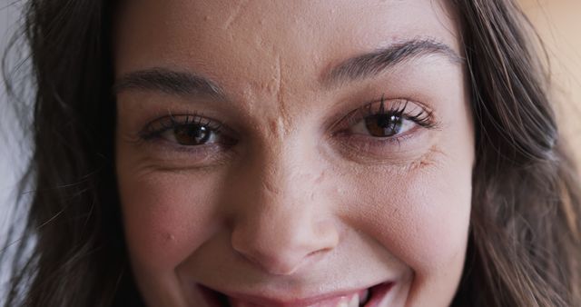 Smiling Woman with Natural Skin Texture Close-Up - Download Free Stock Images Pikwizard.com