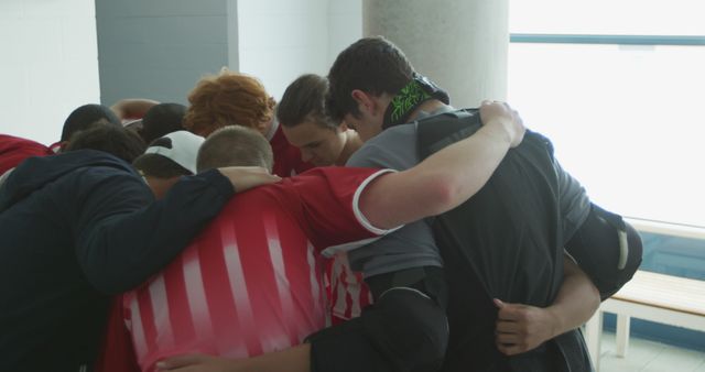 Team Huddle of Young Male Athletes in Locker Room - Download Free Stock Images Pikwizard.com