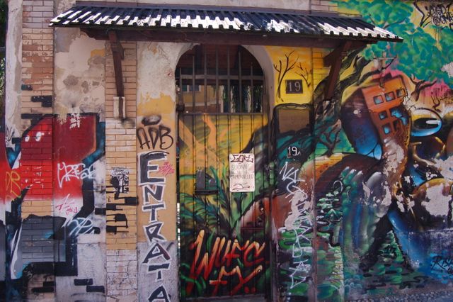 Colorful Urban Street Art Graffiti on Old Building Wall - Download Free Stock Photos Pikwizard.com