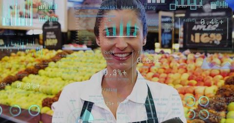 Smiling produce clerk managing fresh fruit display with augmented data overlay