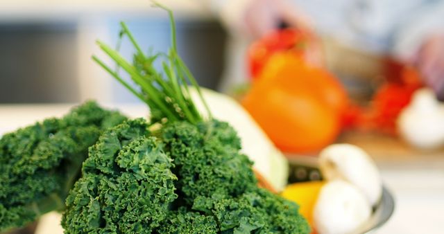 Close-up of Fresh Kale and Vegetables on Kitchen Counter - Download Free Stock Images Pikwizard.com