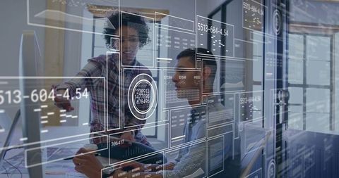 Innovative Professionals Using Futuristic Holograms in High-Tech Office