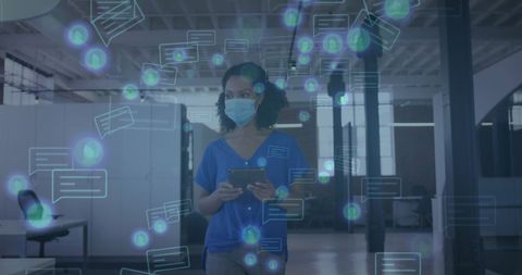 Businesswoman managing social media in high-tech office