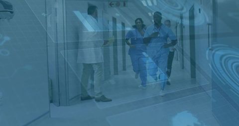 Diverse medical team running in hospital corridor for emergency response