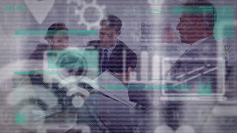 Businesspeople Discussing Technology Integration in Office