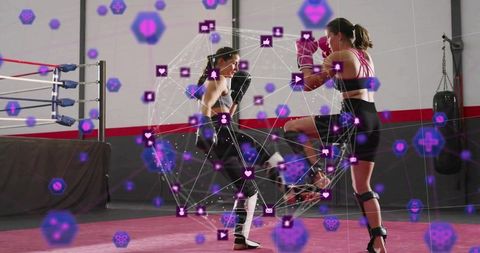 Female Muay Thai sparring partners training in gym with purple digital network overlay