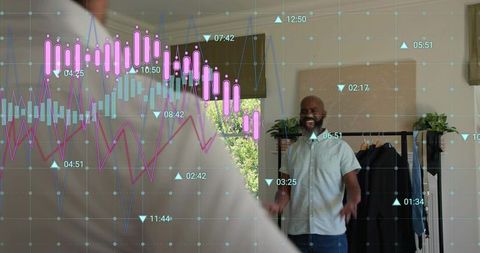 Smiling host gesturing in home studio showcasing fashion rack with data analytics overlay