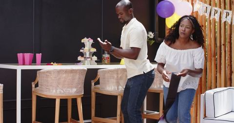 Couple Collaborating on Outdoor Celebration Decor Design