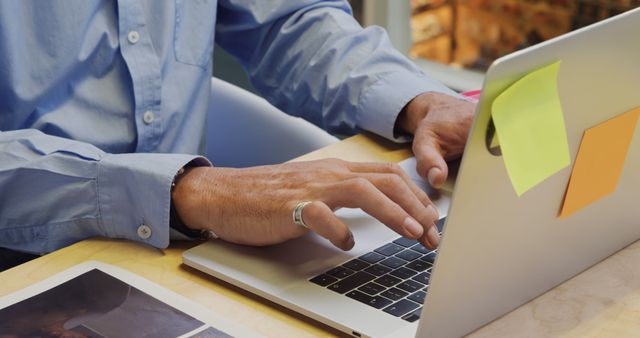 Businessman Typing on Laptop with Sticky Notes - Download Free Stock Images Pikwizard.com