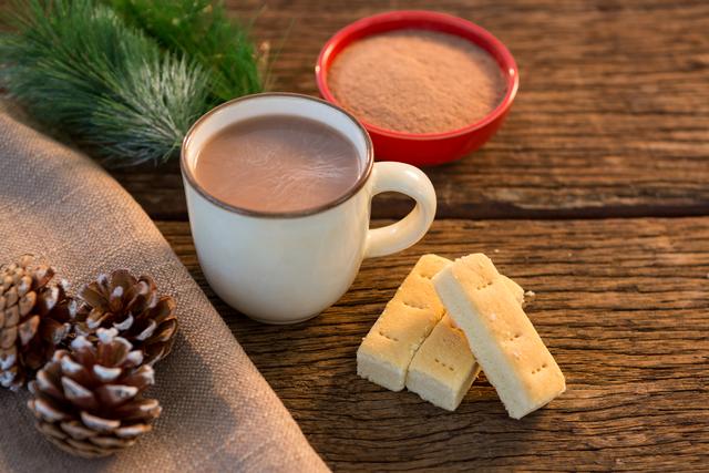 Pine cone, coffee cup, coffee powder, sweet food, and christmas fir with napkin - Download Free Stock Photos Pikwizard.com