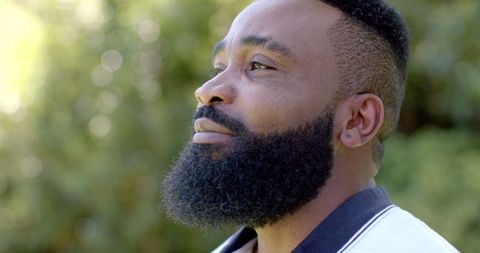 Smiling African American Man Enjoys Nature Outdoors