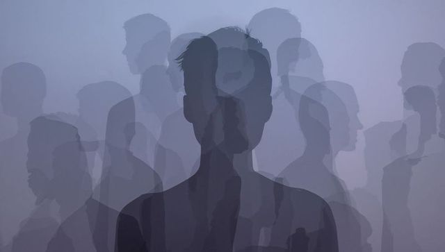Layered translucent silhouettes creating abstract crowd portrait with ethereal overlap
