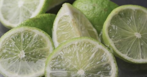 Close Up of Fresh Sliced Limes with Copy Space