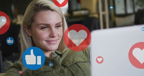 Businesswoman Engaging with Social Media on Laptop