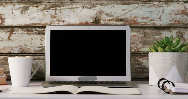 Laptop with Blank Screen on Rustic Desk with Coffee and Plant - Download Free Stock Images Pikwizard.com