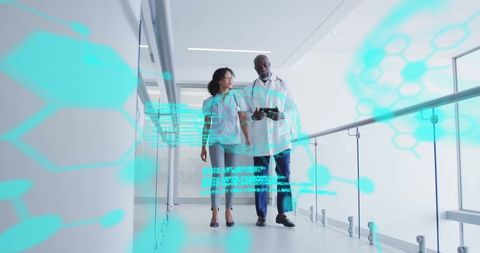 Medical Professionals Analyzing Digital Data in Modern Hospital