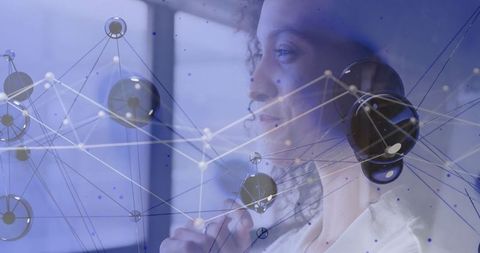 Tech Professional Contemplating Connectivity Interfaced with Digital Networks